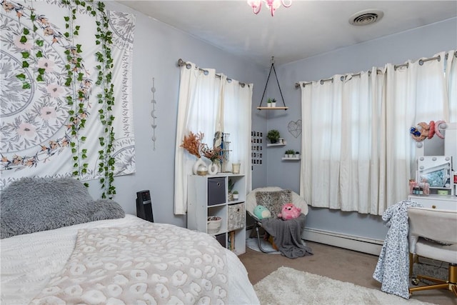 31 Briarcliff Dr, Horseheads, NY 14845 - bedroom with a baseboard heating unit, carpet floors, and visible vents