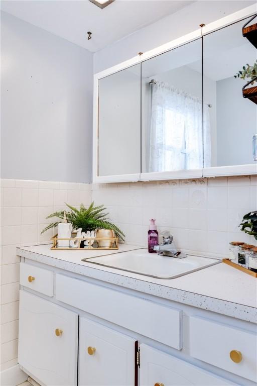 31 Briarcliff Dr, Horseheads, NY 14845 - bathroom with tasteful backsplash and vanity