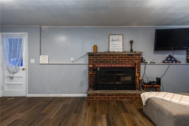 31 Briarcliff Dr, Horseheads, NY 14845 - living area featuring wood finished floors, a brick fireplace, and ornamental molding