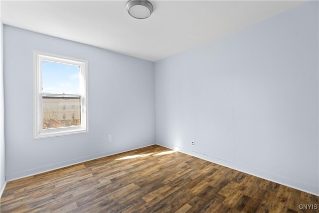 empty room featuring wood finished floors