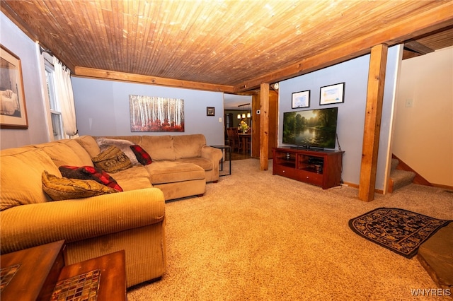 living room featuring stairway, wood ceiling, and carpet