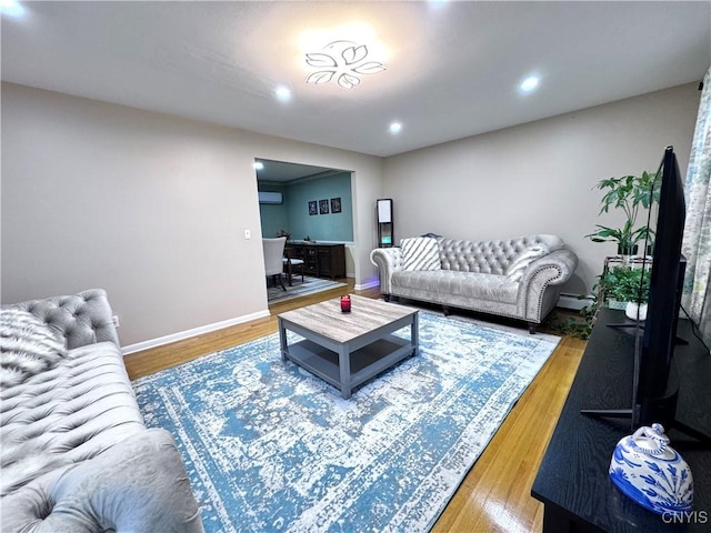 14 Barley Mow Run, New Hartford, NY 13413 - living area with baseboards, wood finished floors, recessed lighting, and baseboard heating