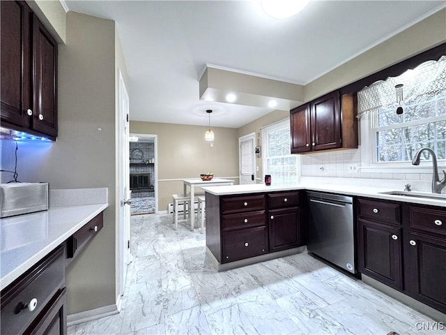 14 Barley Mow Run, New Hartford, NY 13413 - kitchen with light countertops, a sink, a peninsula, stainless steel dishwasher, and marble finish floor