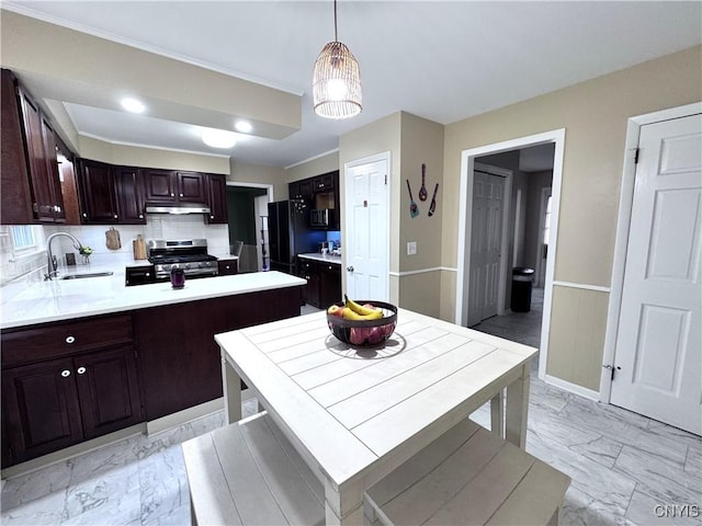14 Barley Mow Run, New Hartford, NY 13413 - kitchen featuring stainless steel range with gas stovetop, marble finish floor, a sink, and dark brown cabinetry