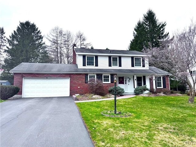 14 Barley Mow Run, New Hartford, NY 13413 - traditional home with brick siding, driveway, a front lawn, and an attached garage