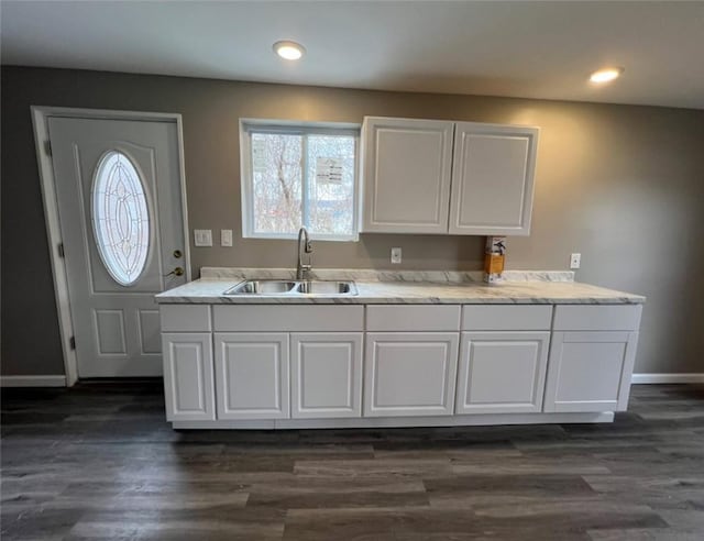 200 Henry St, Montour, NY 14865 - kitchen featuring baseboards, dark wood-style flooring, a sink, and white cabinets