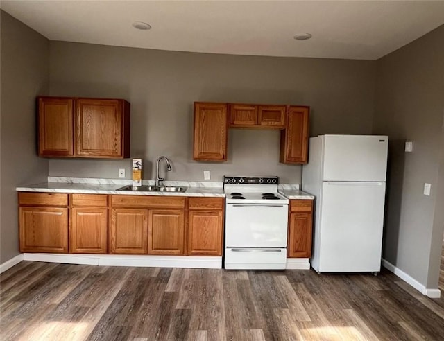 200 Henry St, Montour, NY 14865 - kitchen featuring white appliances, brown cabinets, and a sink