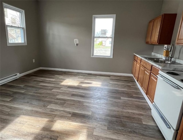 200 Henry St, Montour, NY 14865 - kitchen with baseboards, a sink, white electric stove, and a wealth of natural light