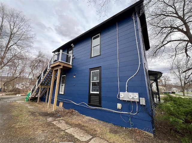 200 Henry St, Montour, NY 14865 - view of side of home featuring stairs and a balcony