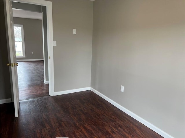 200 Henry St, Montour, NY 14865 - unfurnished room with baseboards and dark wood finished floors