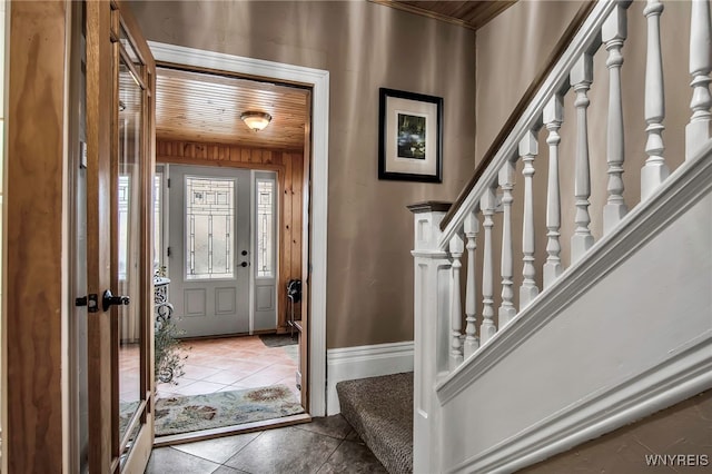 2831 S Park Ave, Lackawanna, NY 14218 - tiled entrance foyer with wooden ceiling, baseboards, and stairway