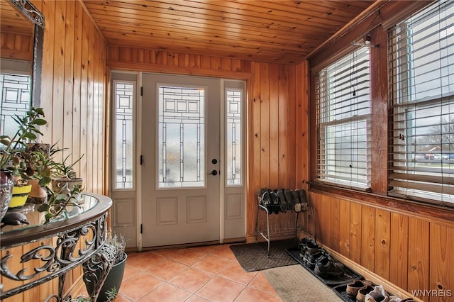 2831 S Park Ave, Lackawanna, NY 14218 - entrance foyer featuring wooden ceiling, light tile patterned floors, and wooden walls