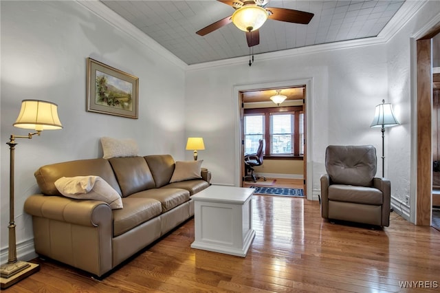 2831 S Park Ave, Lackawanna, NY 14218 - living room with crown molding, baseboards, a ceiling fan, and hardwood / wood-style flooring