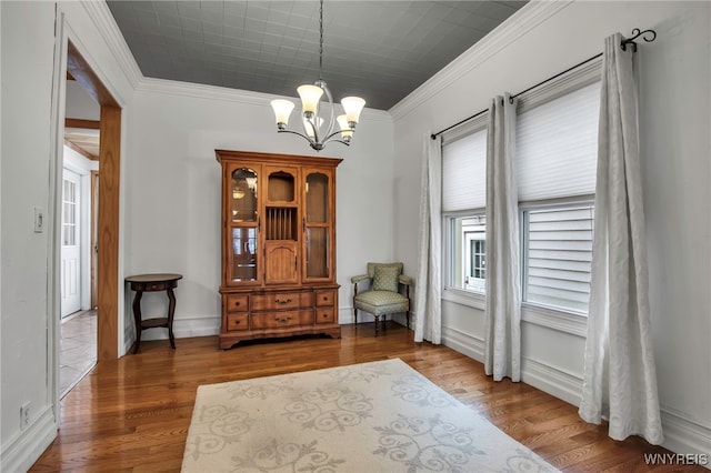 2831 S Park Ave, Lackawanna, NY 14218 - sitting room with crown molding, a notable chandelier, and wood finished floors