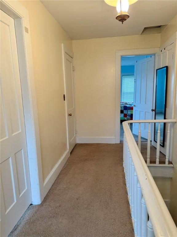 35 Sand St, Afton, NY 13730 - hall with light carpet and baseboards