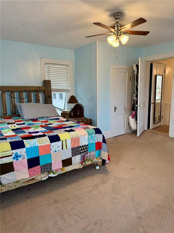 35 Sand St, Afton, NY 13730 - carpeted bedroom featuring a ceiling fan