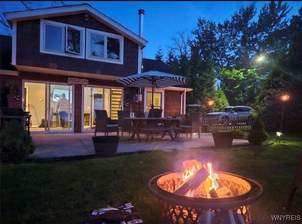 2307 Lincoln Ave, Wilson, NY 14172 - back of house with a patio area and an outdoor fire pit