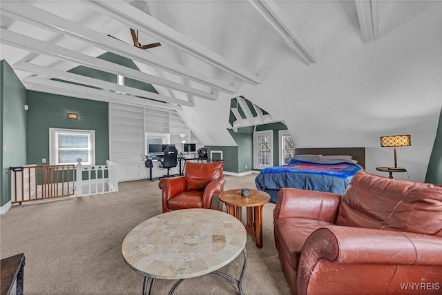 carpeted living area featuring built in features, baseboards, and a ceiling fan