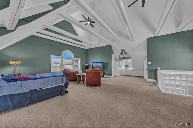 bedroom with beam ceiling, high vaulted ceiling, and carpet flooring