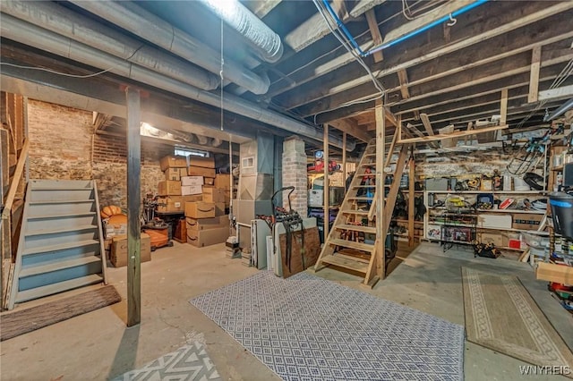 unfinished below grade area featuring stairway