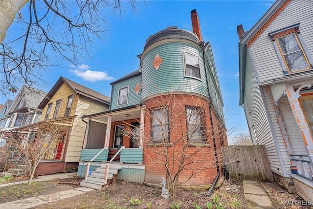 victorian-style house with a porch