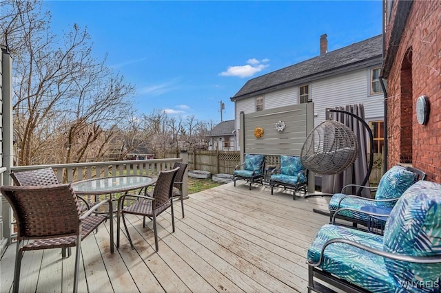 deck featuring fence