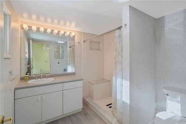 3158 W Lake Rd, Cazenovia, NY 13035 - full bath featuring vanity, a shower with curtain, toilet, and wood finished floors