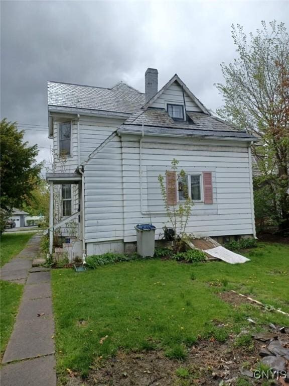 482 Roe Ave, Elmira-City, NY 14901 - rear view of property featuring a yard and a chimney