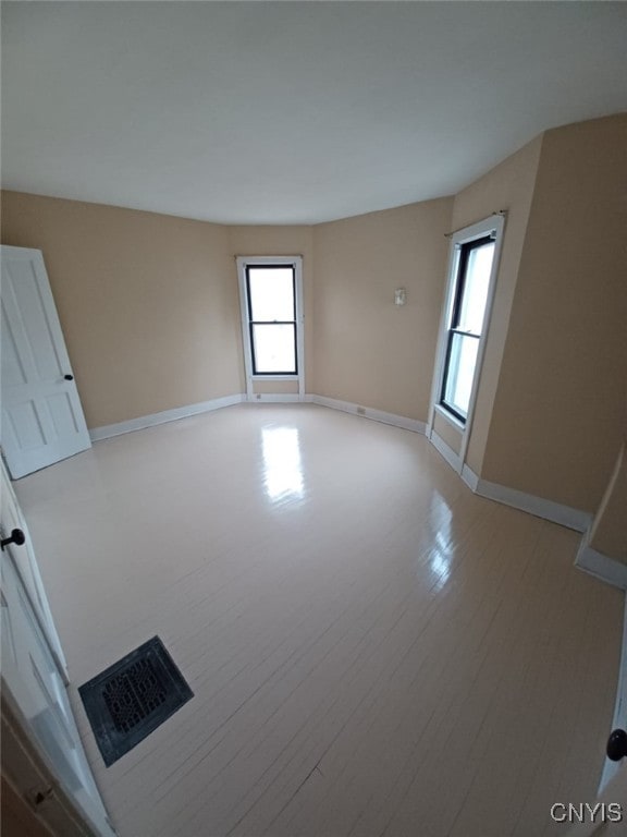 482 Roe Ave, Elmira-City, NY 14901 - empty room with light wood-style flooring and baseboards