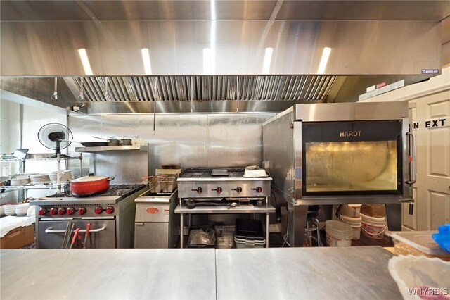 894 Tonawanda St, Buffalo, NY 14207 - kitchen featuring high end stainless steel range oven and wall chimney range hood
