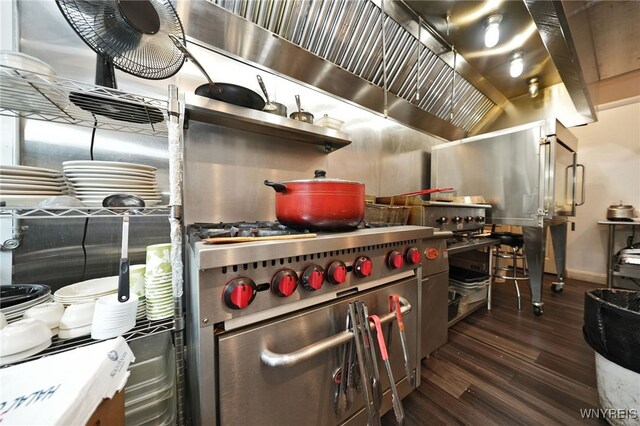 894 Tonawanda St, Buffalo, NY 14207 - kitchen featuring high end stainless steel range oven, wood finished floors, and baseboards