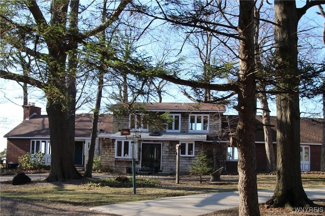 6634 Lake Shore Rd, Evans, NY 14047 - shingle-style home with a chimney