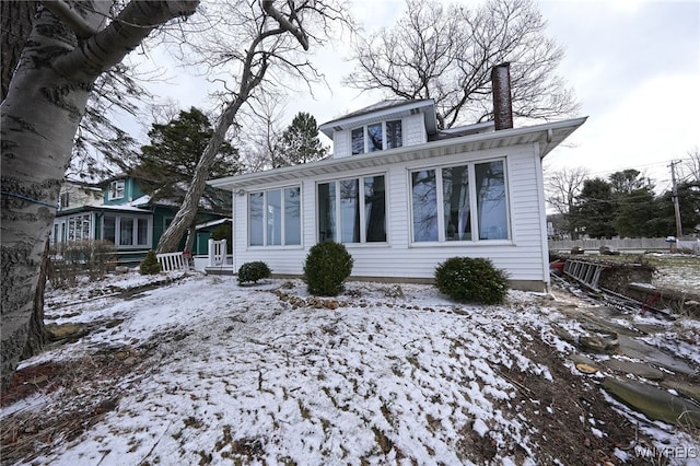 8784 Lake Shore Rd, Evans, NY 14006 - american foursquare style home with a chimney