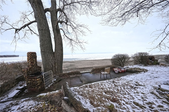 8784 Lake Shore Rd, Evans, NY 14006 - yard covered in snow featuring a water view