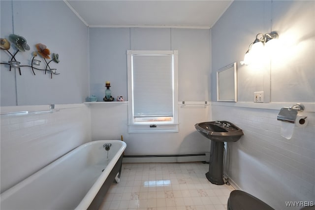 8784 Lake Shore Rd, Evans, NY 14006 - full bathroom featuring baseboard heating, crown molding, a freestanding tub, and tile patterned floors