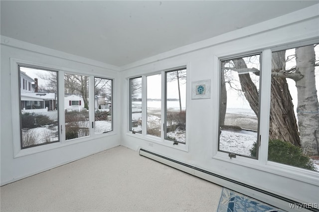 8784 Lake Shore Rd, Evans, NY 14006 - unfurnished sunroom featuring a baseboard heating unit, plenty of natural light, and carpet