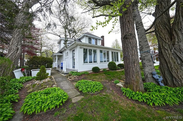8784 Lake Shore Rd, Evans, NY 14006 - view of property exterior with a chimney