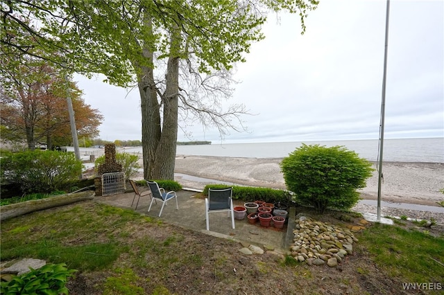 8784 Lake Shore Rd, Evans, NY 14006 - view of yard featuring view of water and beach and a patio area