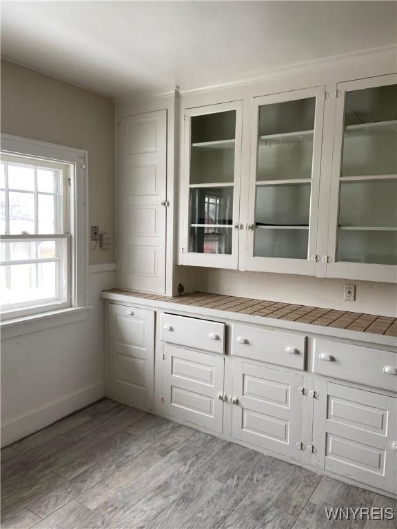 333 Colvin Ave, Buffalo, NY 14216 - bar with light wood-style floors and baseboards