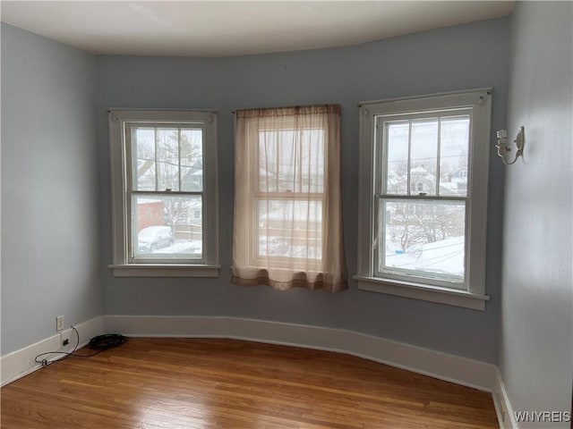 333 Colvin Ave, Buffalo, NY 14216 - unfurnished room featuring baseboards and wood finished floors