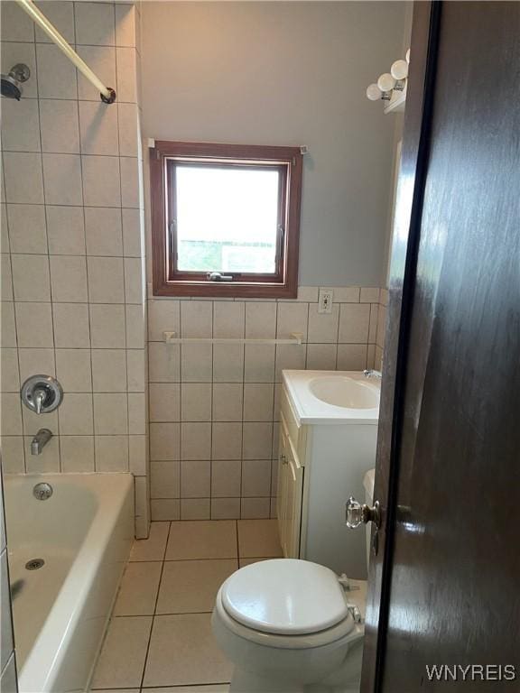 333 Colvin Ave, Buffalo, NY 14216 - full bath with bathtub / shower combination, vanity, tile patterned flooring, toilet, and tile walls