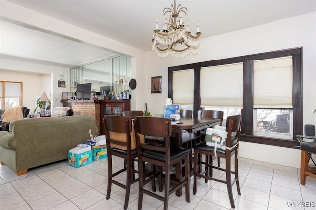 333 Colvin Ave, Buffalo, NY 14216 - dining space with an inviting chandelier and light tile patterned floors