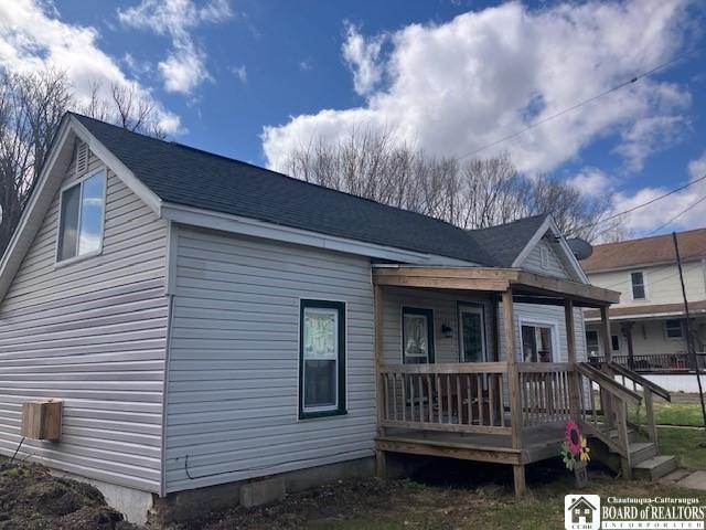 59 Pearl St, Hanover, NY 14062 - rear view of property featuring covered porch