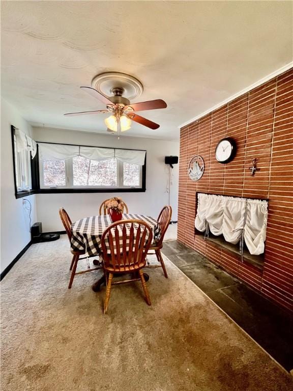 115 Forest Hills Dr, Elmira, NY 14905 - dining room with a ceiling fan, baseboards, and carpet
