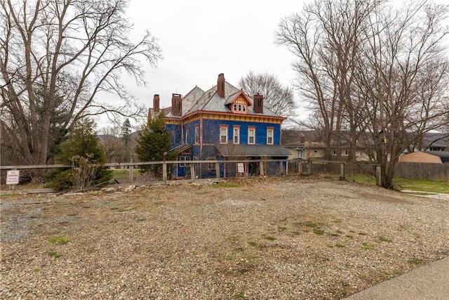 24 W 2nd St, Corning-City, NY 14830 - view of front of property featuring a chimney and fence