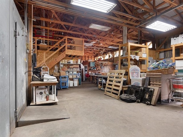 interior space with concrete flooring and a workshop area