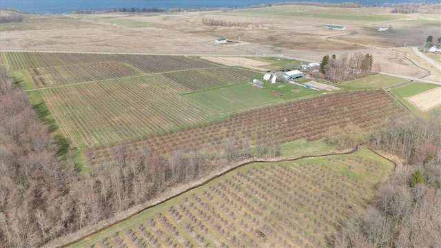 birds eye view of property with a rural view