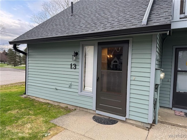 13 Wildflower, Ellicottville, NY 14731 - doorway to property with a shingled roof