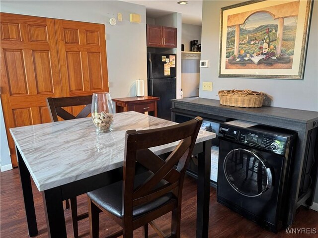 13 Wildflower, Ellicottville, NY 14731 - dining space featuring washer / dryer and dark wood finished floors