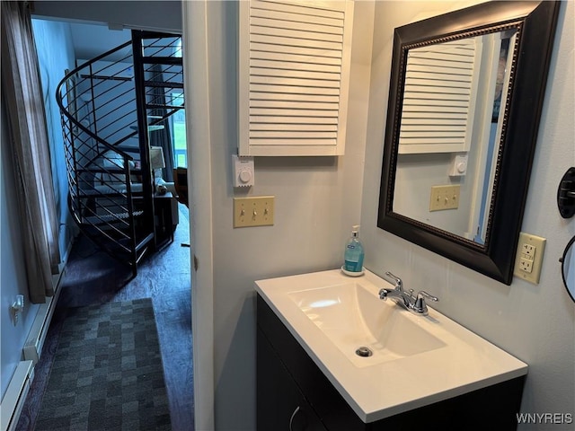 13 Wildflower, Ellicottville, NY 14731 - bathroom with a baseboard radiator and vanity